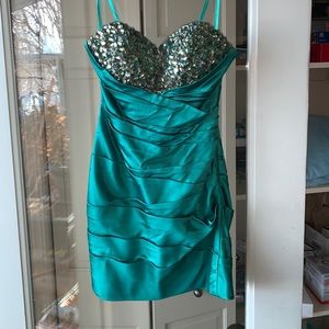 Emerald green bejeweled la femme mini dress